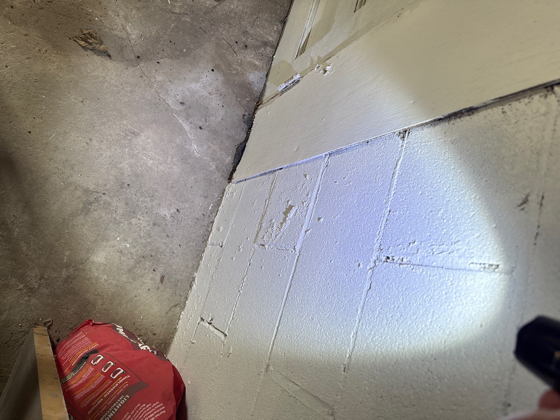 Basement foundation crack and concrete shrinkage assessment in New Jersey home.